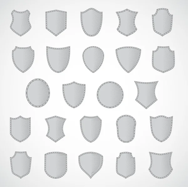 Silver shield design set with various shapes. Style engraving — Stock Vector