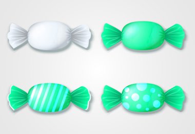  Paketleyicileri - beyaz ve mavi renkli şekerler kümesi