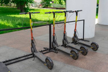 Russia, Moscow, May 24, 2021 Scooter rental. Walking on a scooter.