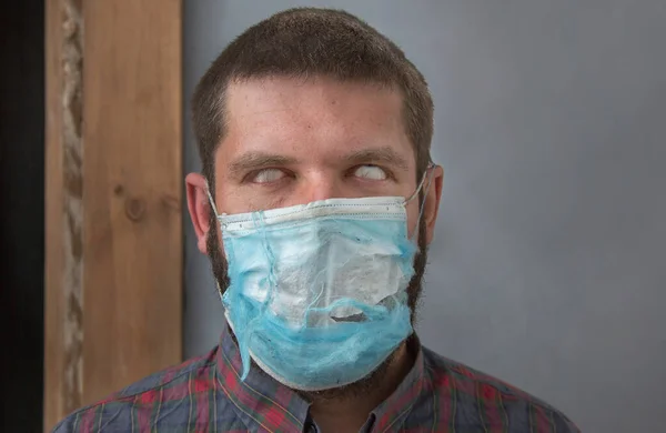 Terrible Face Man Rolled Eyes Torn Medical Mask Concept Fear — Stock Photo, Image