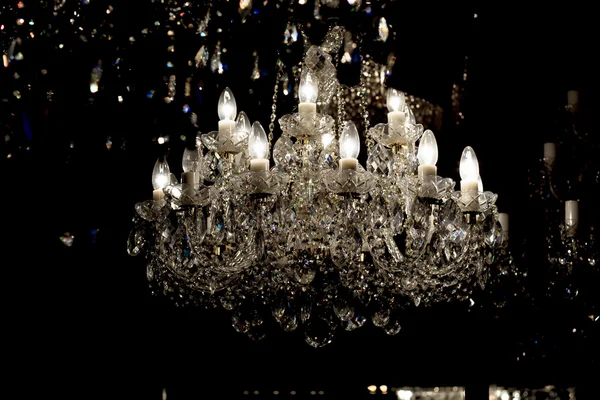 Brass chandelier with crystal.