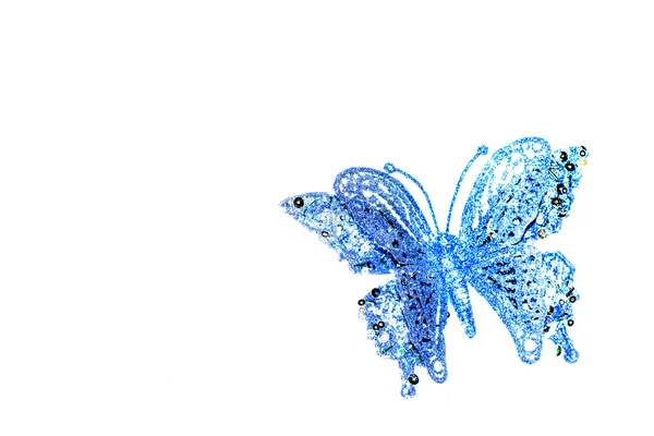 Blauer Schmetterling auf weißem Hintergrund. — Stockfoto