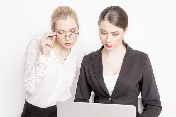 Two business woman on a white background. — Stock Photo, Image