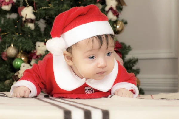Criança pequena na roupa do Papai Noel . — Fotografia de Stock
