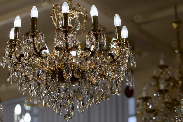 Brass chandelier with crystal. — Stock Photo, Image