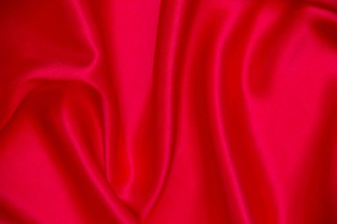 Kırmızı bez dalga arkaplan dokusu.