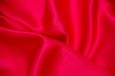 Kırmızı bez dalga arkaplan dokusu.