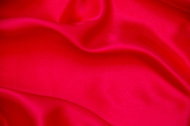 Kırmızı bez dalga arkaplan dokusu.