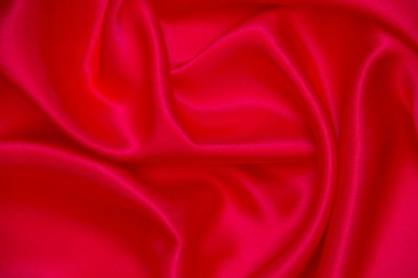 Kırmızı bez dalga arkaplan dokusu.