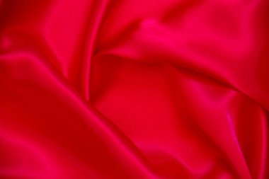 Kırmızı bez dalga arkaplan dokusu.