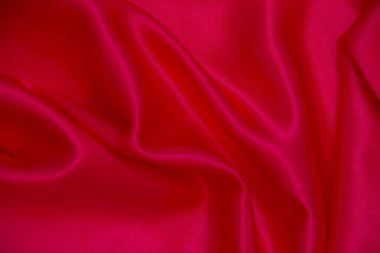 Kırmızı bez dalga arkaplan dokusu.