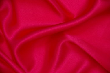 Kırmızı bez dalga arkaplan dokusu.