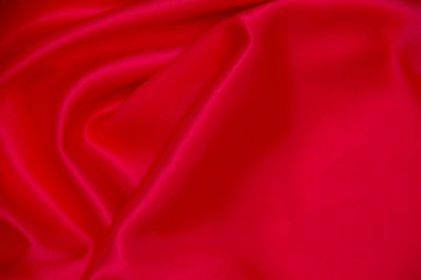 Kırmızı bez dalga arkaplan dokusu.