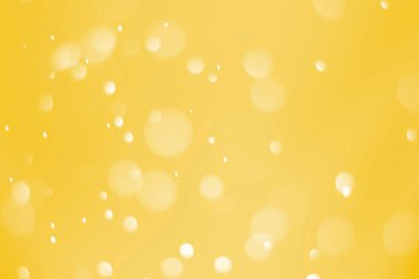 Bokeh odaklı ışıklarla altın soyut arkaplan