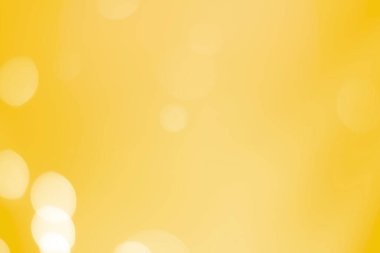 Bokeh odaklı ışıklarla altın soyut arkaplan