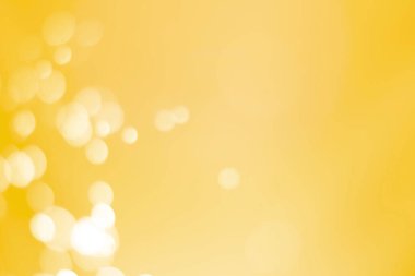 Bokeh odaklı ışıklarla altın soyut arkaplan