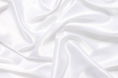 Yumuşak dalgalı beyaz bez arkaplan.