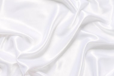 Yumuşak dalgalı beyaz bez arkaplan.