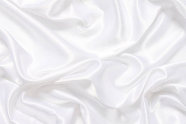 Yumuşak dalgalı beyaz bez arkaplan.