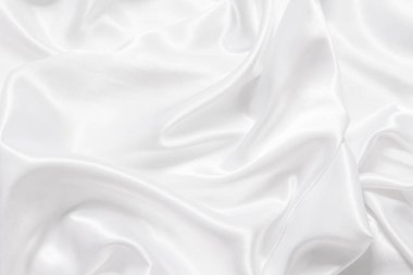 Yumuşak dalgalı beyaz bez arkaplan.