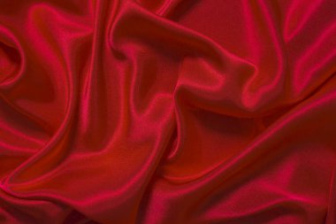 Soyut bir arkaplan ya da sıvı bir dalga ya da katlanmış ipek, grunge, saten, Noel arkaplanı.