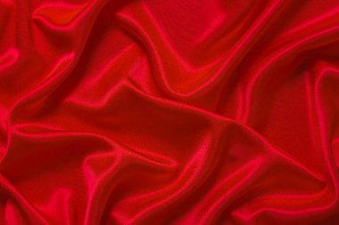 Soyut bir arkaplan ya da sıvı bir dalga ya da katlanmış ipek, grunge, saten, Noel arkaplanı.