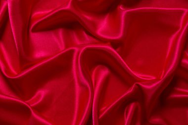 Soyut bir arkaplan ya da sıvı bir dalga ya da katlanmış ipek, grunge, saten, Noel arkaplanı.