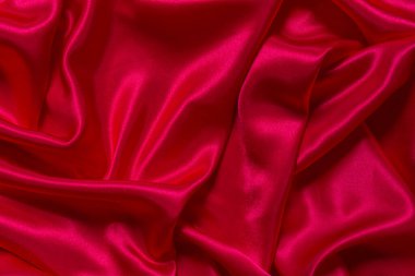 Soyut bir arkaplan ya da sıvı bir dalga ya da katlanmış ipek, grunge, saten, Noel arkaplanı.