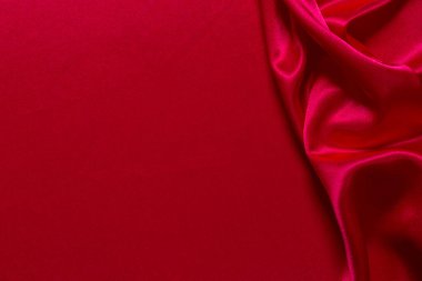 Soyut bir arkaplan ya da sıvı bir dalga ya da katlanmış ipek, grunge, saten, Noel arkaplanı.