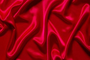 Soyut bir arkaplan ya da sıvı bir dalga ya da katlanmış ipek, grunge, saten, Noel arkaplanı.