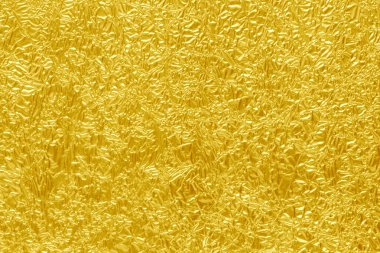 Parlak sarı yaprak altın folyo dokusu arka plan