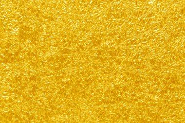 Parlak sarı yaprak altın folyo dokusu arka plan