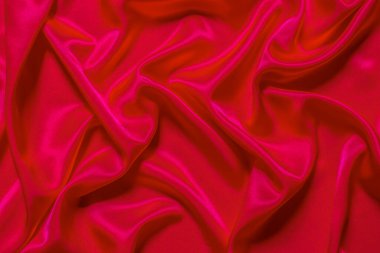 Kırmızı bez dalga arkaplan dokusu.