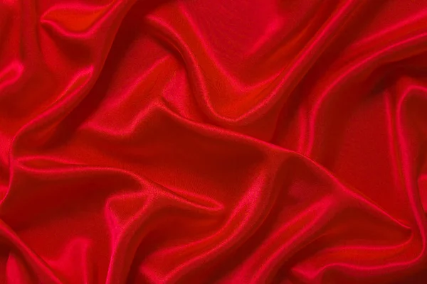 Soyut bir arkaplan ya da sıvı bir dalga ya da katlanmış ipek, grunge, saten, Noel arkaplanı.