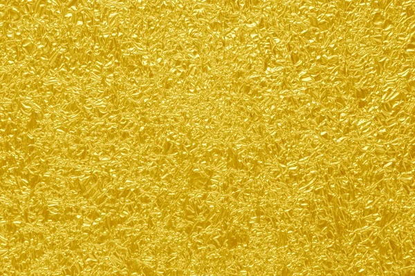 光沢のある黄色の葉の金箔の質感の背景 — ストック写真