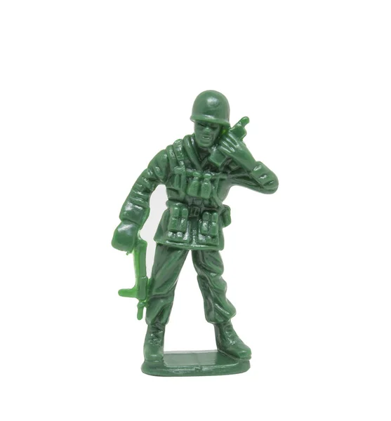 Beyaz arka planda minyatür oyuncak asker, yakın plan