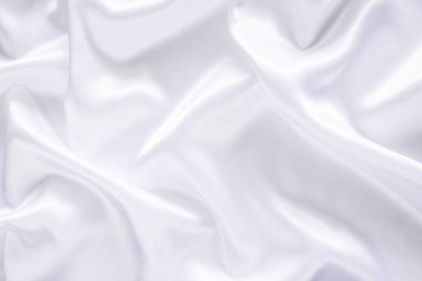 Yumuşak dalgalı beyaz bez arkaplan.