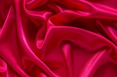 Kırmızı bez dalga arkaplan dokusu.