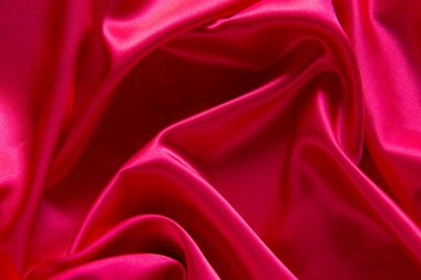 Kırmızı bez dalga arkaplan dokusu.