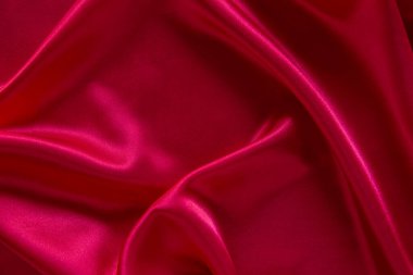 Kırmızı bez dalga arkaplan dokusu.