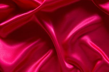 Kırmızı bez dalga arkaplan dokusu.