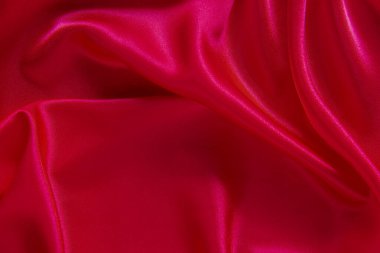 Kırmızı bez dalga arkaplan dokusu.