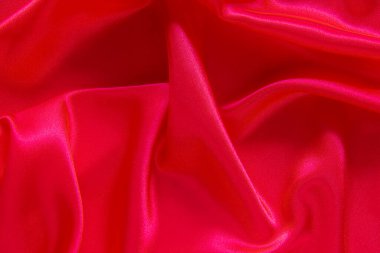 Kırmızı bez dalga arkaplan dokusu.