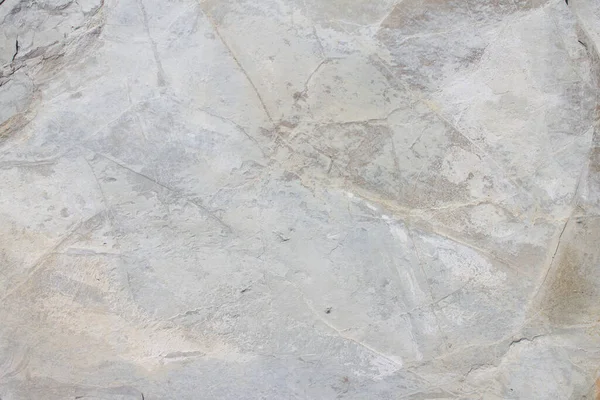 Arkaplan olarak granüler kireçtaşı kaya yüzeyi