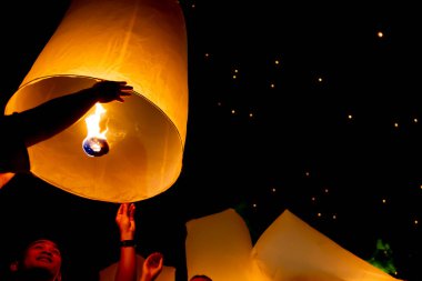 Loy Krathong and Yi Peng lantern festival in Chiang Mai, Thailand November  11, 2019. Traditions passed on for hundreds of years. clipart