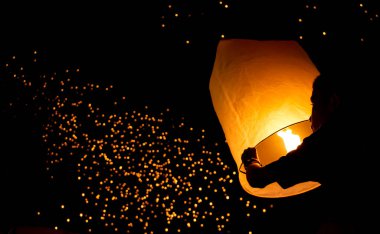 Loy Krathong and Yi Peng lantern festival in Chiang Mai, Thailand November  11, 2019. Traditions passed on for hundreds of years. clipart
