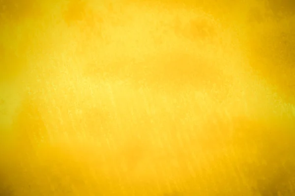 Parlak sarı yaprak altın folyo dokusu arka plan