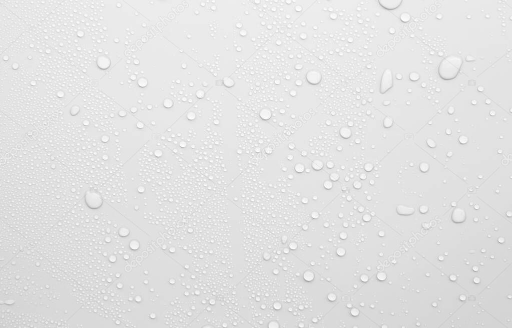 water drop on white surface as background