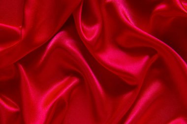 Kırmızı bez dalga arkaplan dokusu.