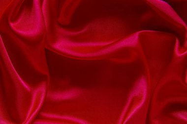 Kırmızı bez dalga arkaplan dokusu.